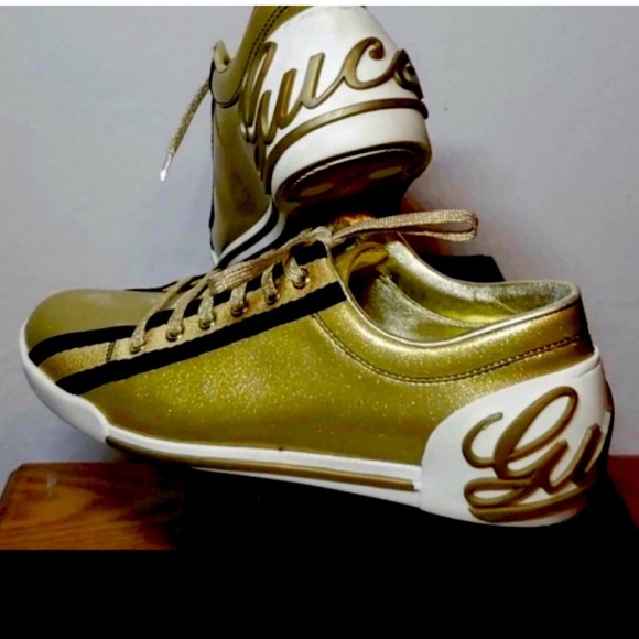 Gucci Metallic Gold Sneakers with Black Detail - Picture 1 of 3